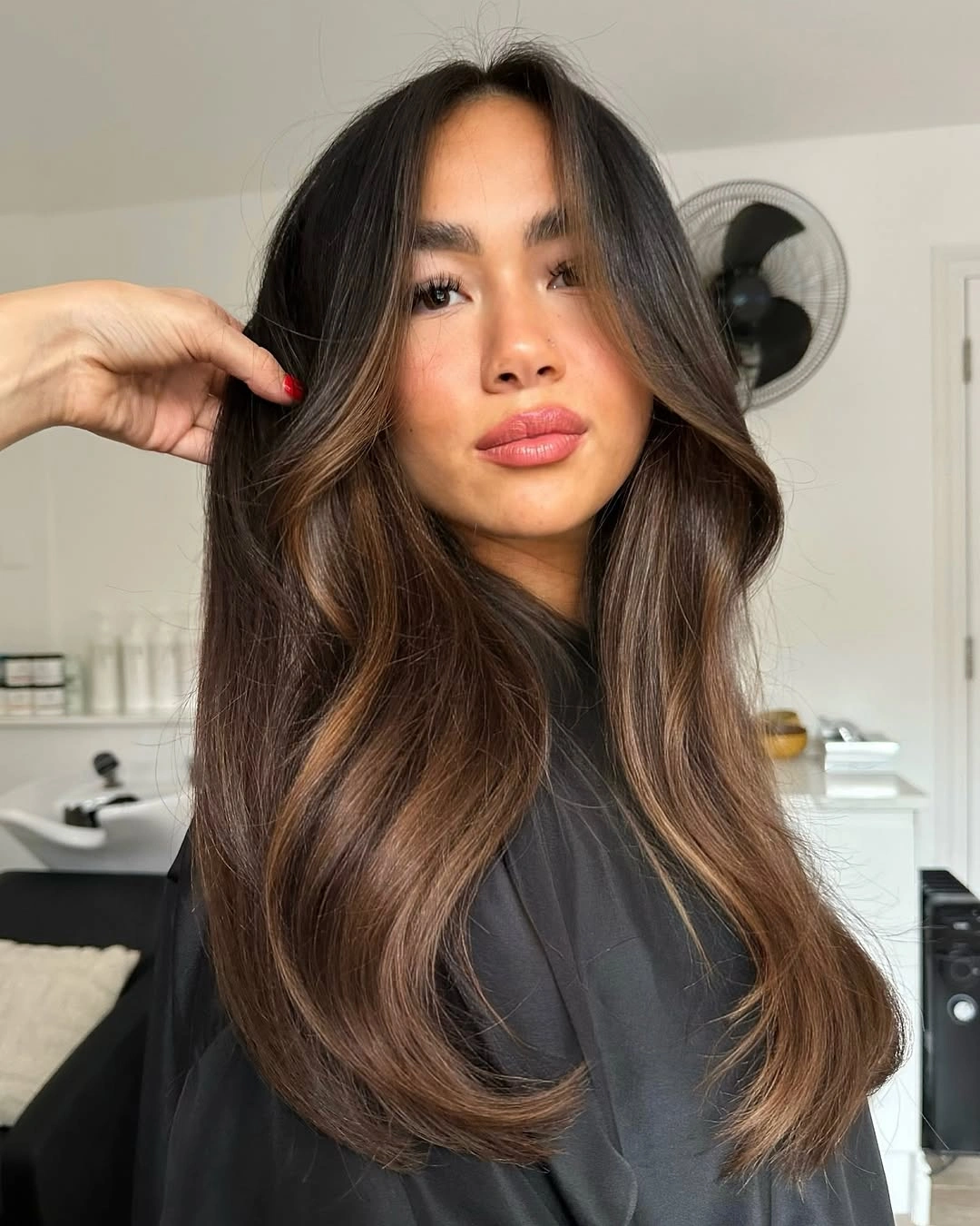 dimensional brunette hair color Long Voluminous Brunette Blowout With Soft Curves