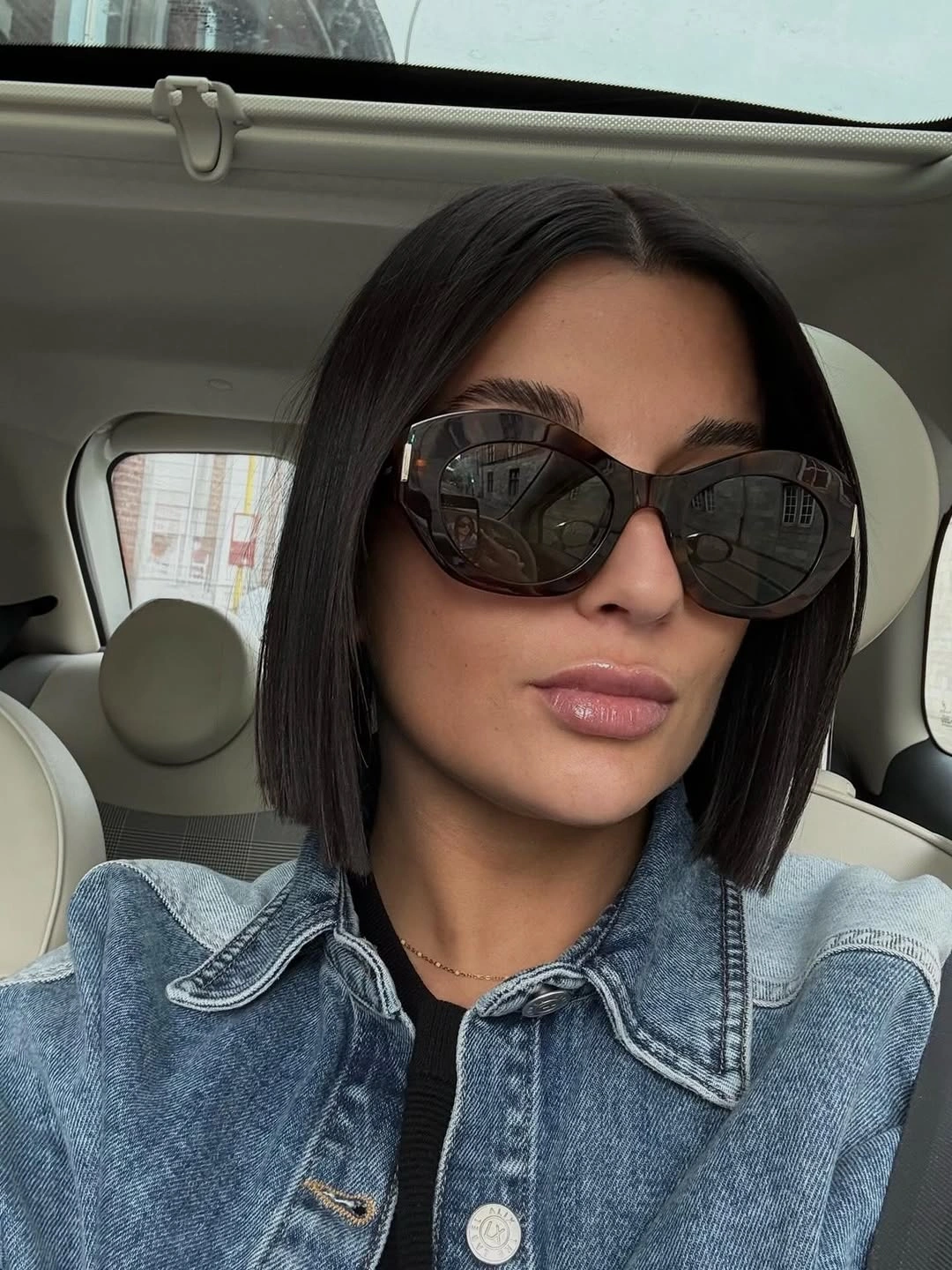 dimensional brunette hair color Sharp Straight Brunette Bob With A Center Part