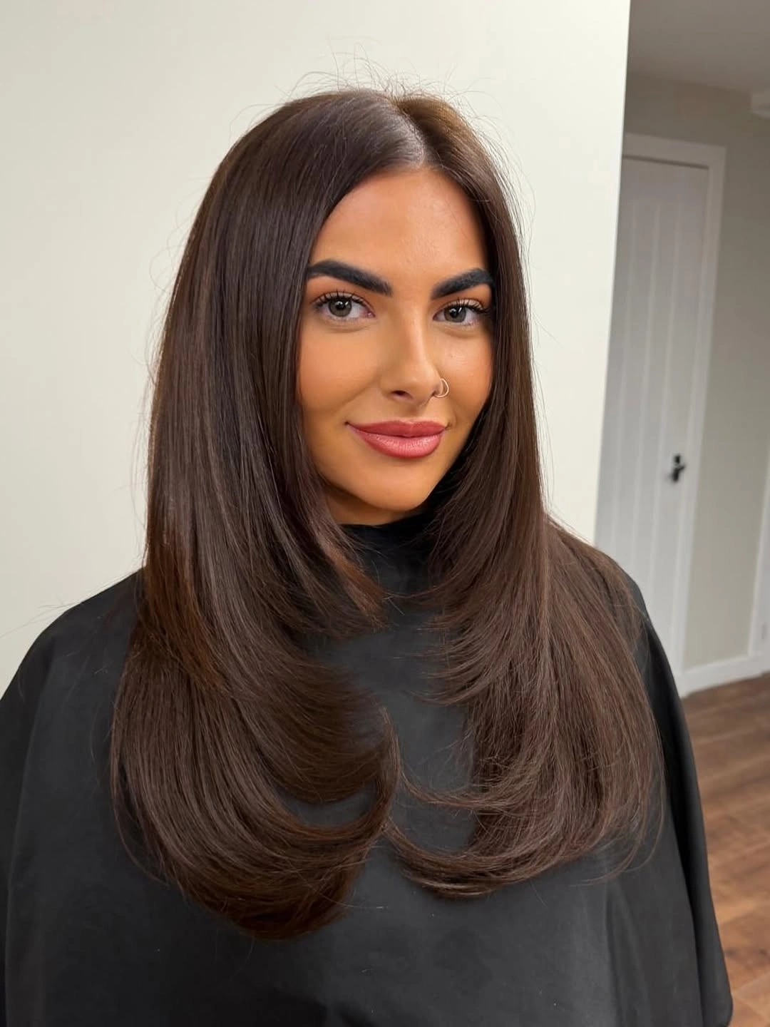 dimensional brunette hair color Smooth Brunette Layers With A Rounded Edge