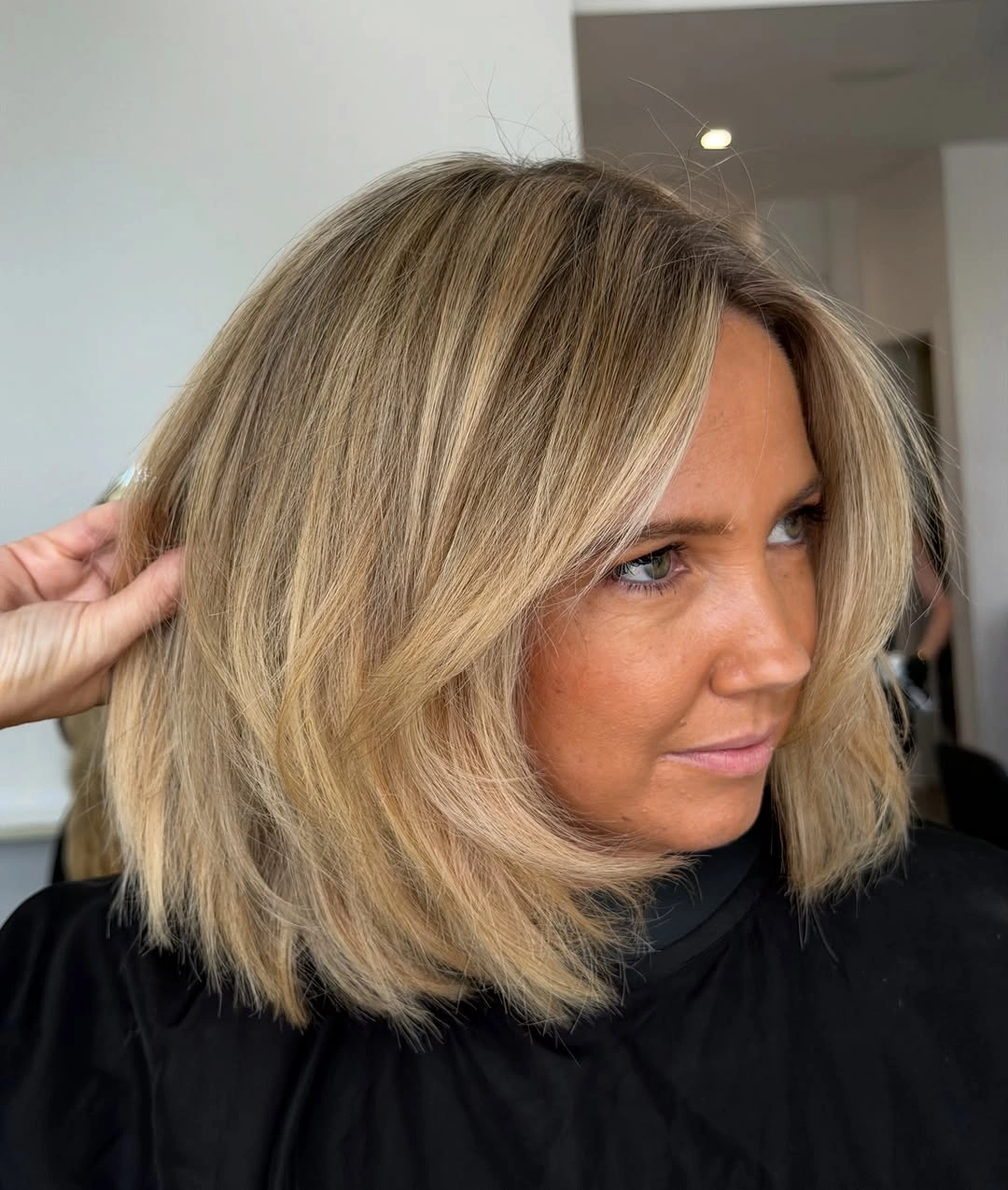 dirty blonde hair color Classic Shoulder-Length Dirty Blonde Bob With Soft Volume