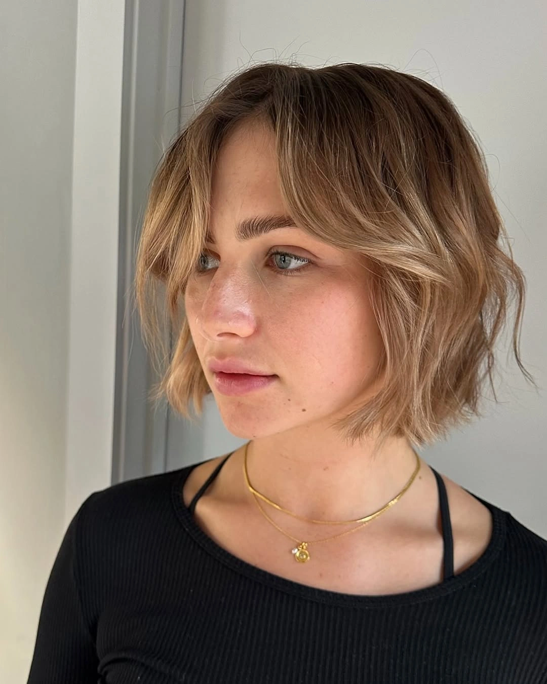 dirty blonde hair color French Bob Inspired Dirty Blonde With Curtain Bangs