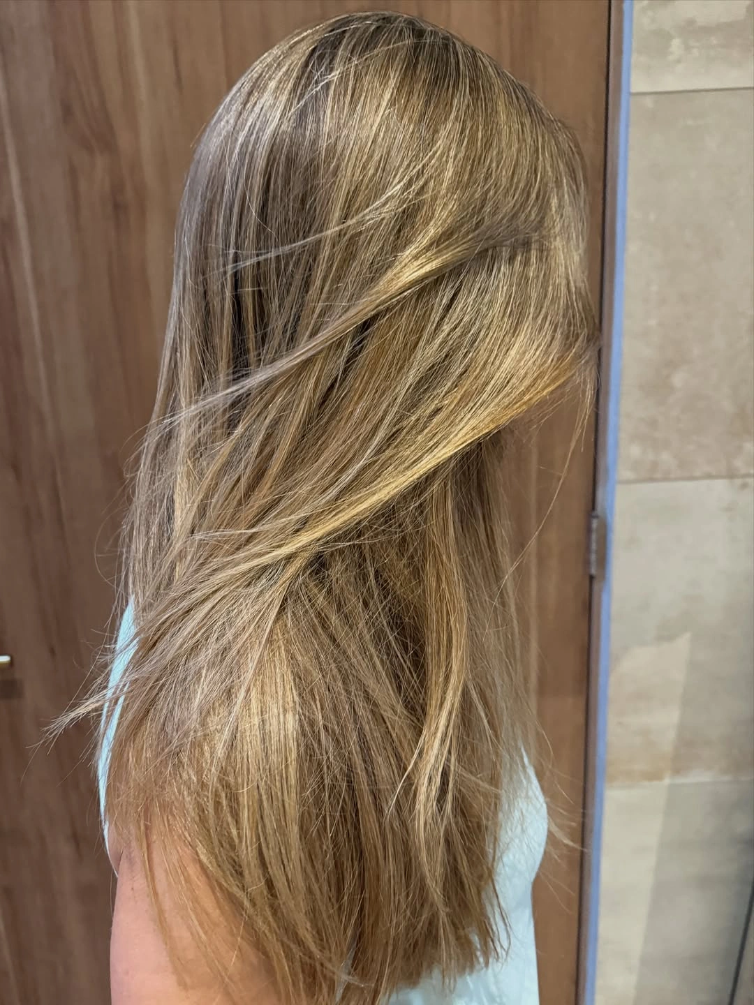 dirty blonde hair color Golden Dirty Blonde Layers With Sunlit Warmth