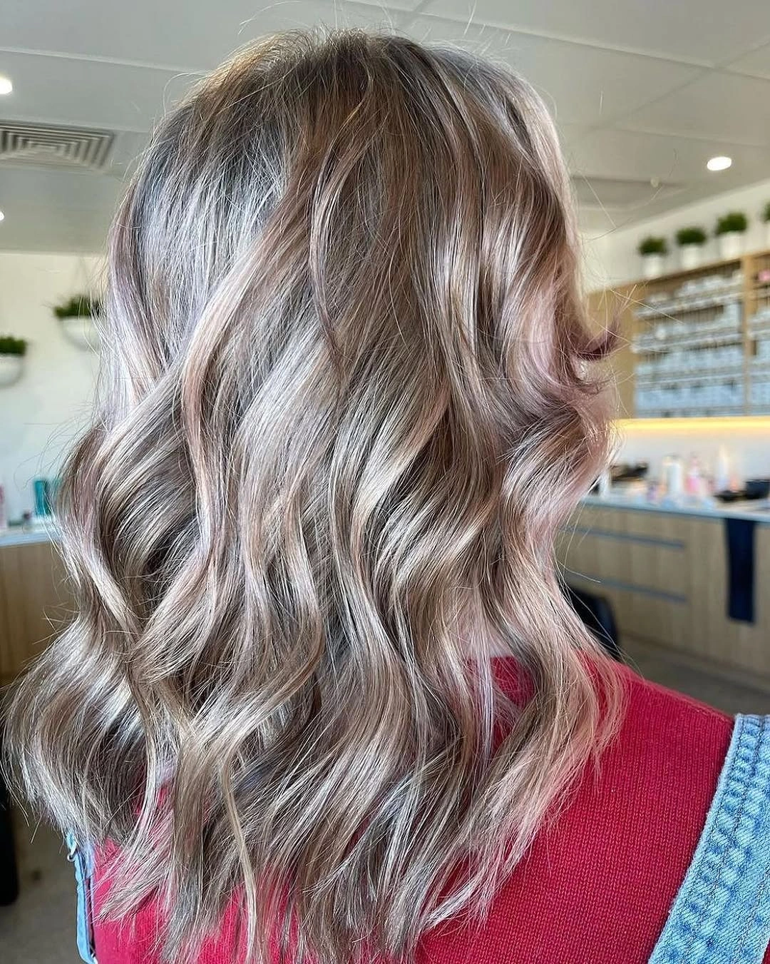 dirty blonde hair color Smoky Beige Dirty Blonde Waves With Silky Finish
