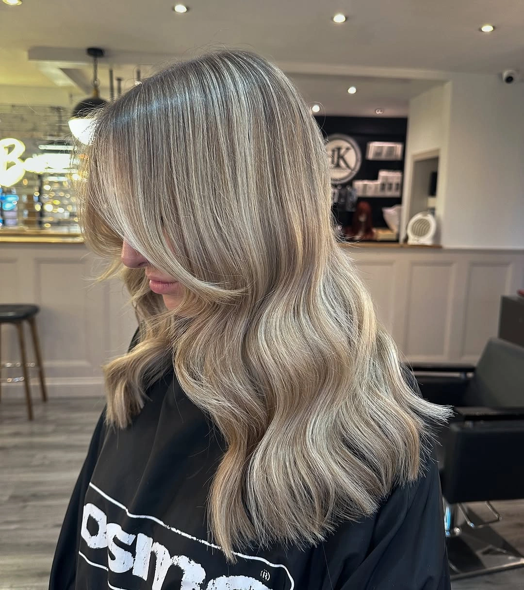 dirty blonde hair color Dimensional Wavy Dirty Blonde With Soft Beige Highlights