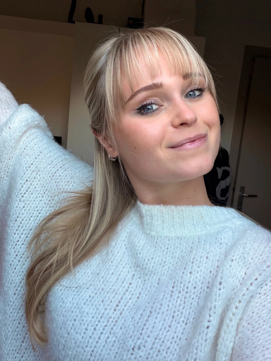 dirty blonde hair color Soft Vanilla Dirty Blonde With Wispy Full Bangs