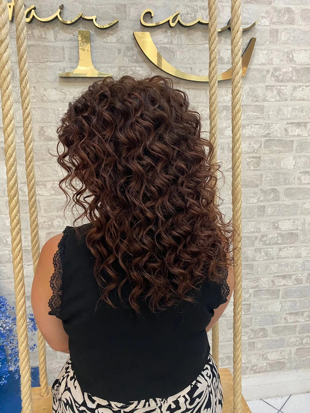 Fall brunette hair colour 2026 Rich Auburn Chocolate Curls with Incredible Volume