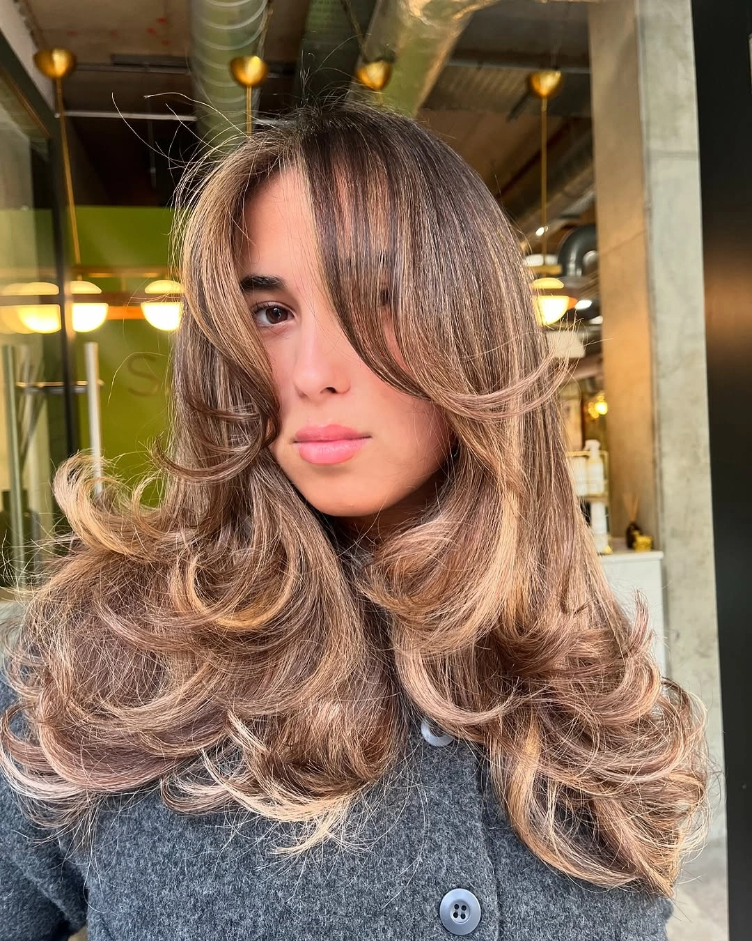 Fall brunette hair colour 2026 Luxurious Mushroom Brunette with Airy Curtain Layers