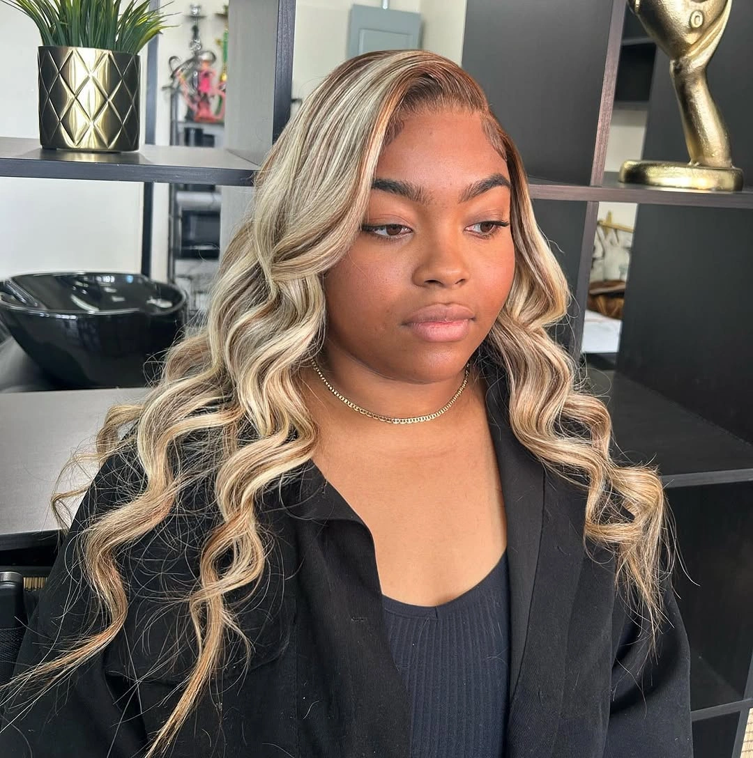 fall hair colors for black women 2026 Champagne Blonde Balayage With Seamless Waves