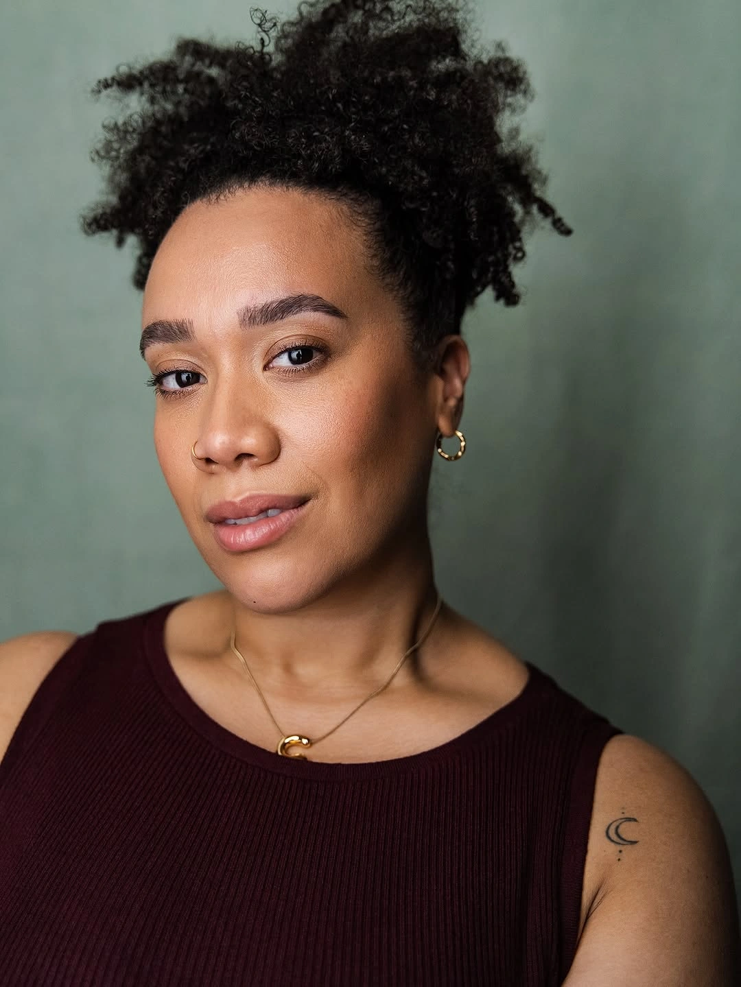 fall hair colors for black women 2026 Natural Textured Puff With Soft Everyday Elegance
