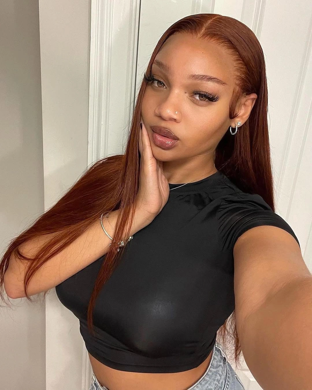 fall hair colors for black women 2026 Rich Auburn Straight Hair That Feels Timeless
