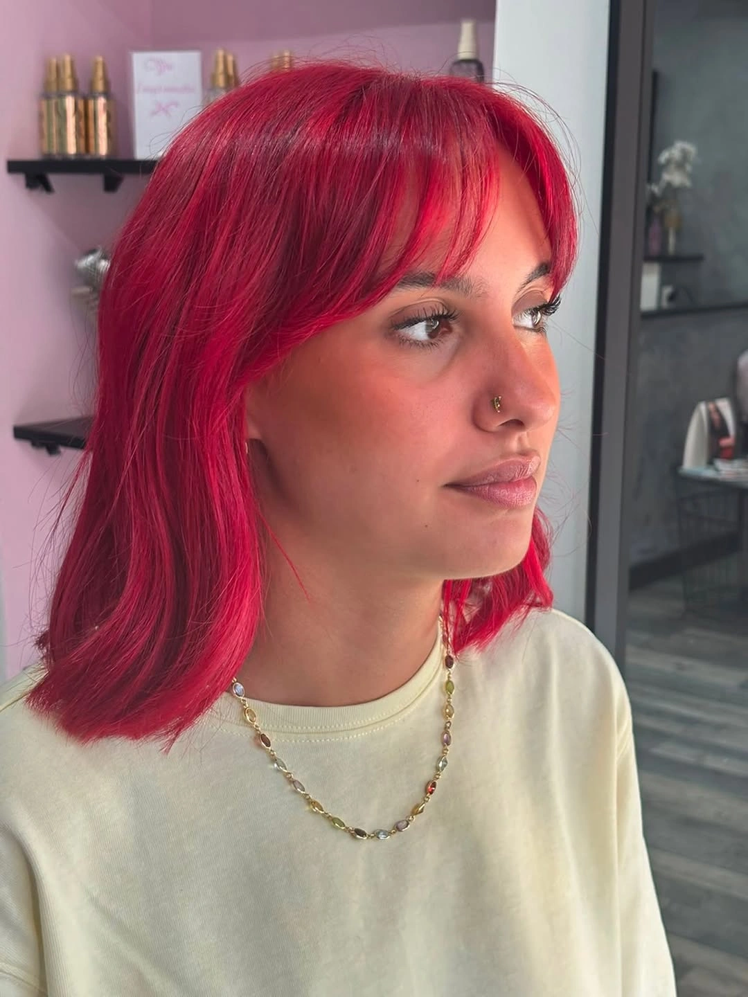 Fall hair colour ideas 2026 Electric Raspberry French Bob with Curtain Bangs