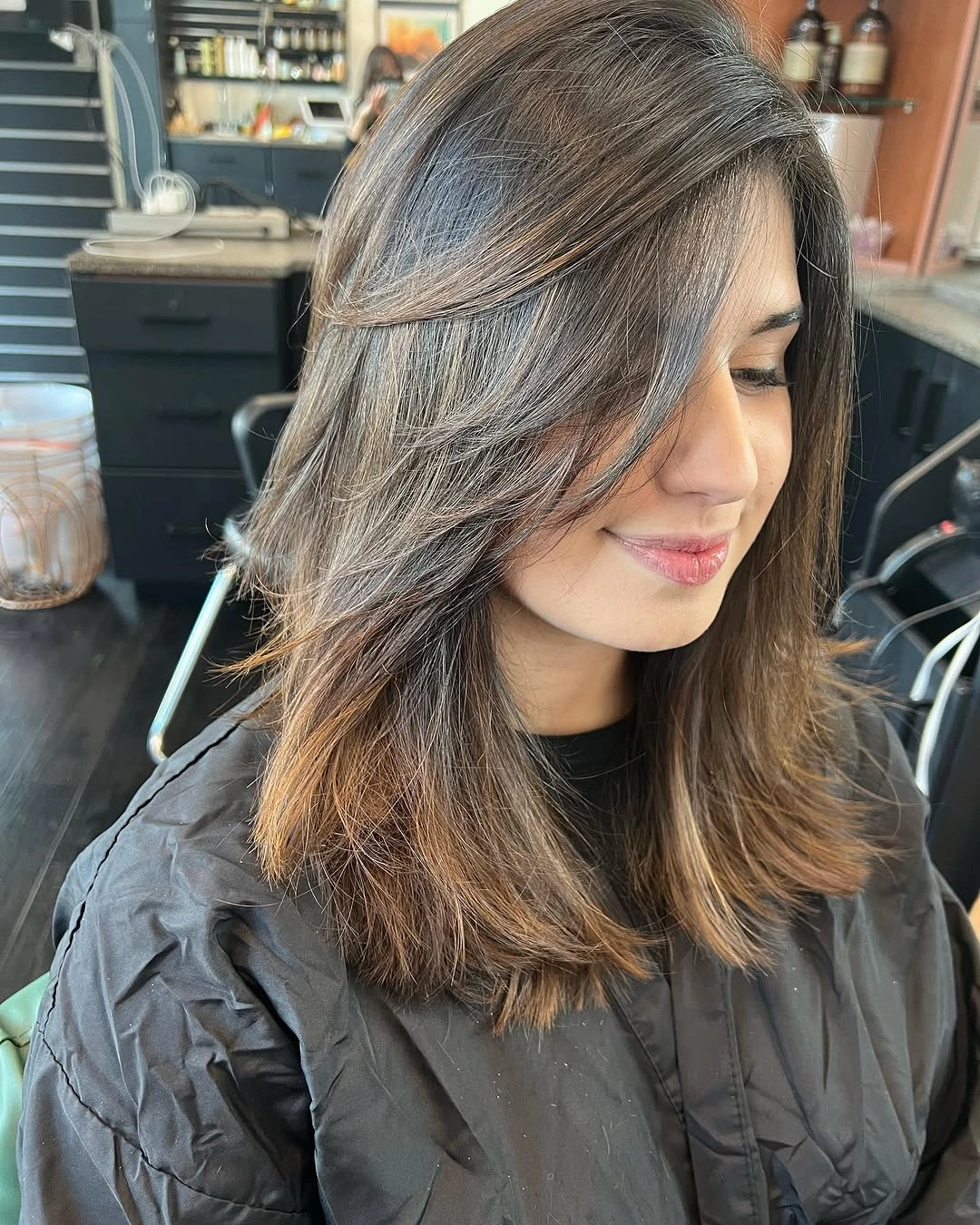 fall haircuts for women 2026 Glossy Brunette Layers With Curtain Fringe