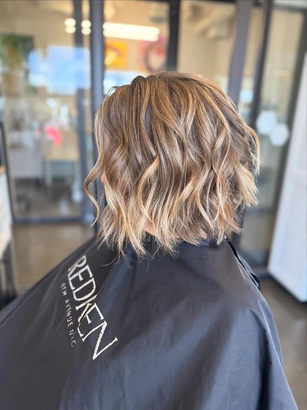 fall haircuts for women 2026 Soft Wavy Blonde Bob With Dimensional Balayage