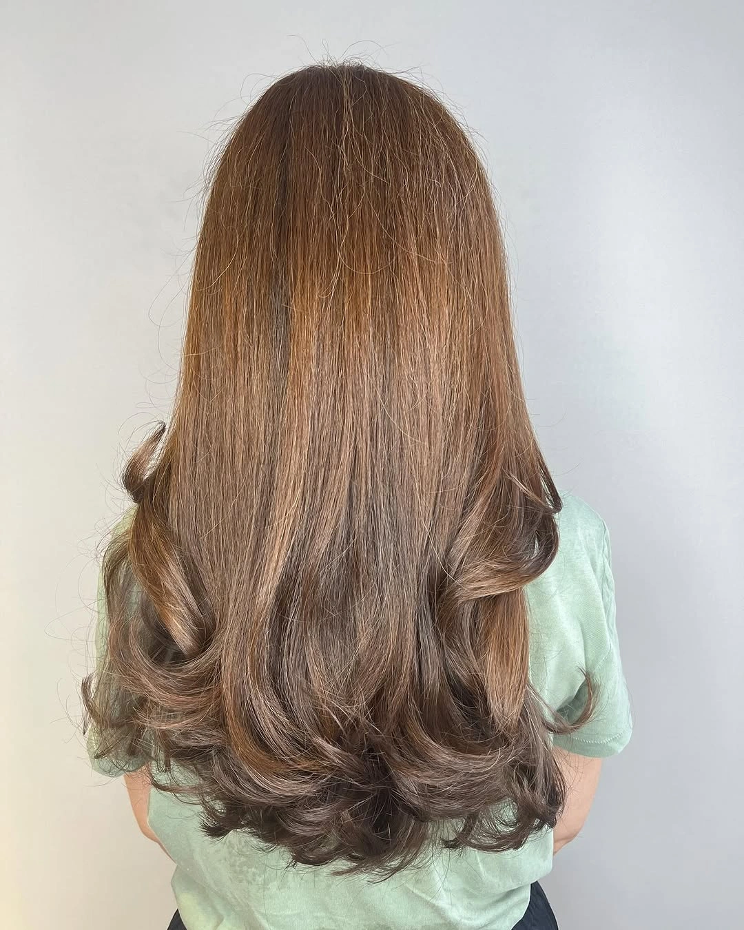 fall haircuts for women 2026 Long Espresso Layers With Soft Curved Ends