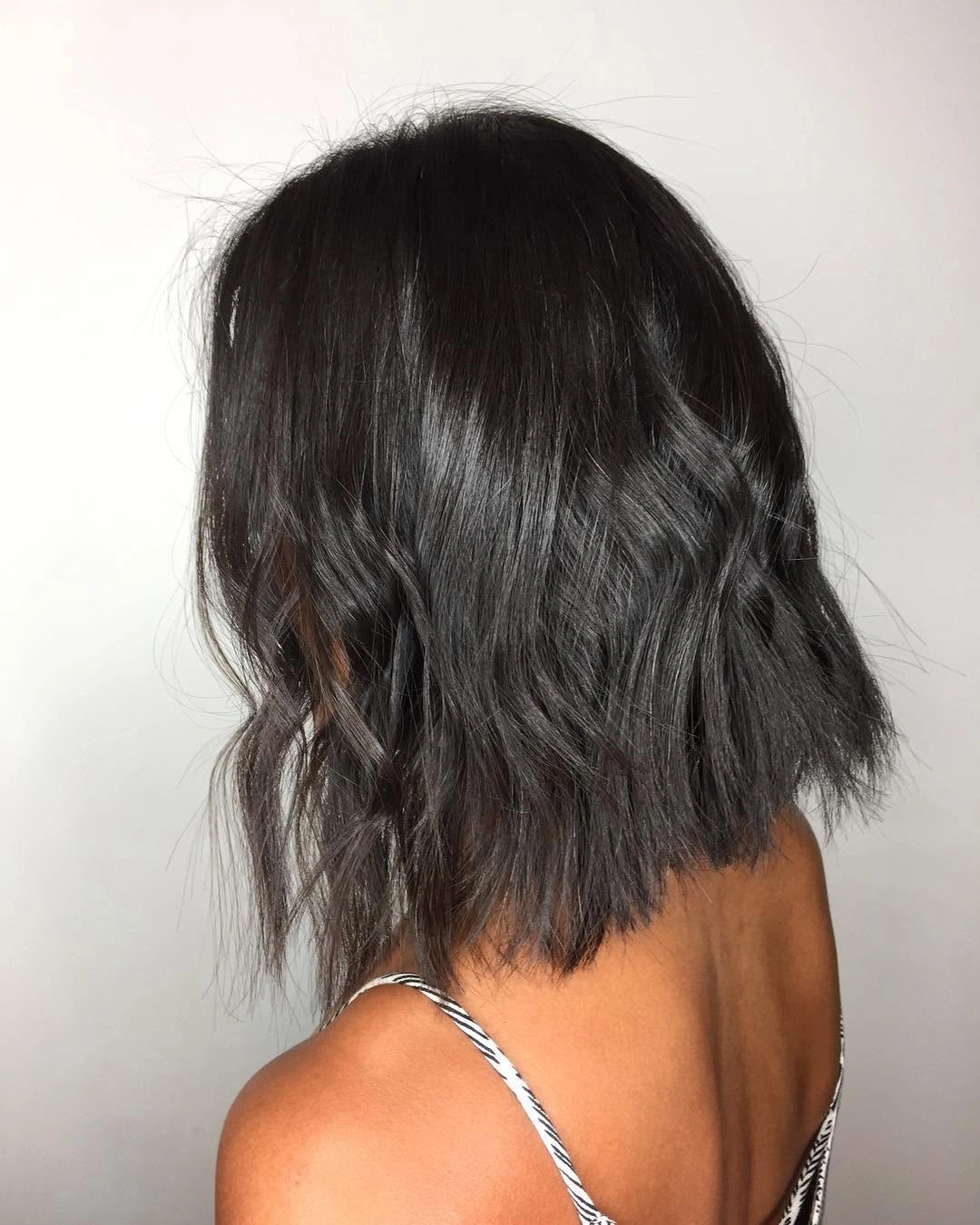 fall haircuts for women 2026 Glossy Midnight Bob With Modern Texture