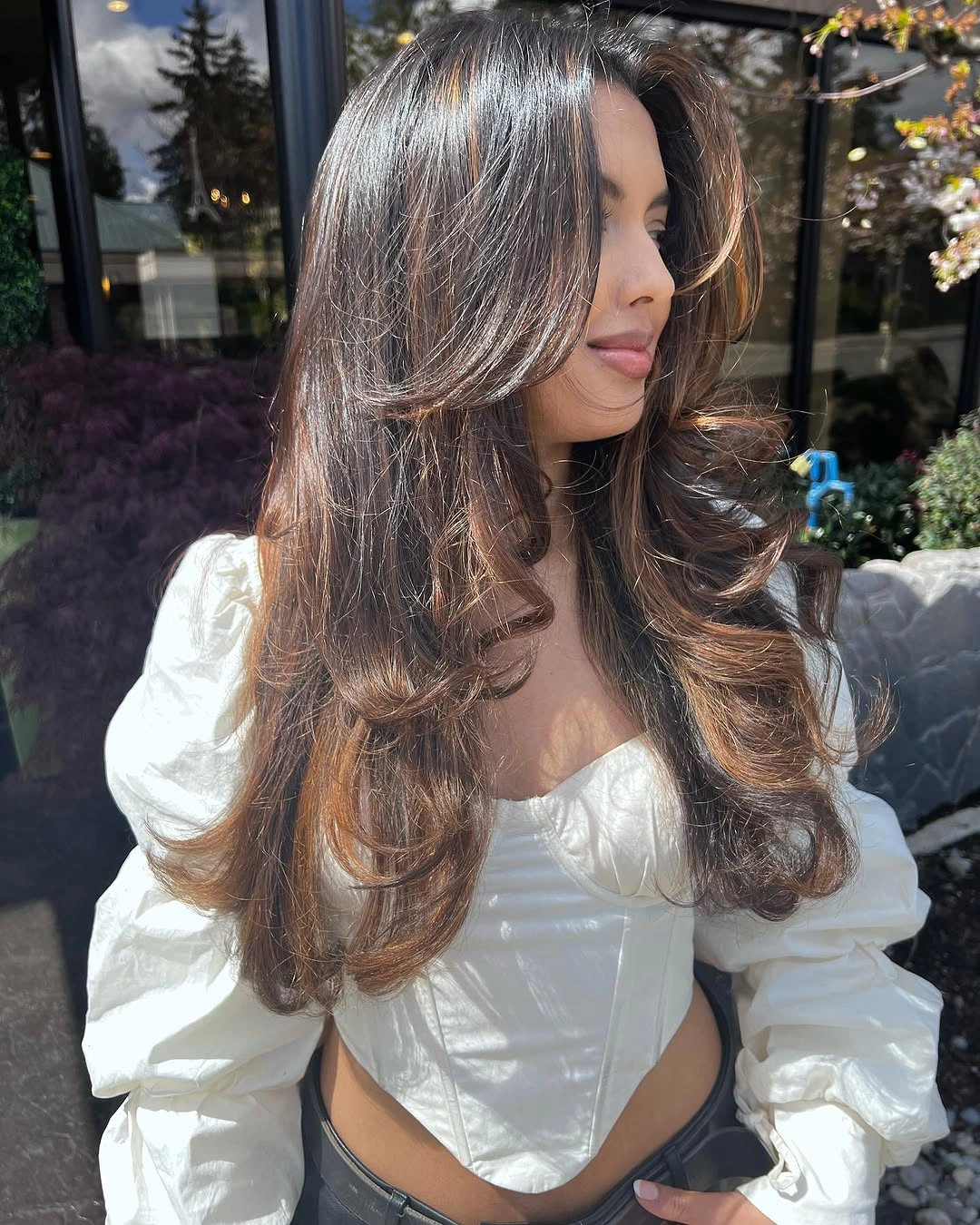 fall haircuts for women 2026 Voluminous Butterfly Layers With Espresso Dimension