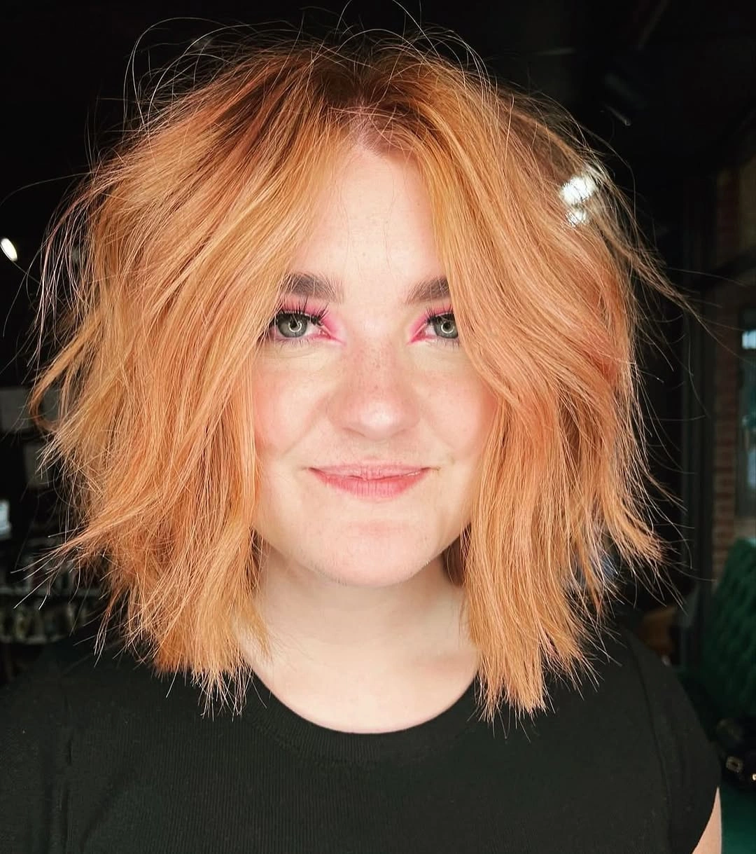 fall haircuts for women 2026 Playful Apricot Shag Bob With Airy Texture
