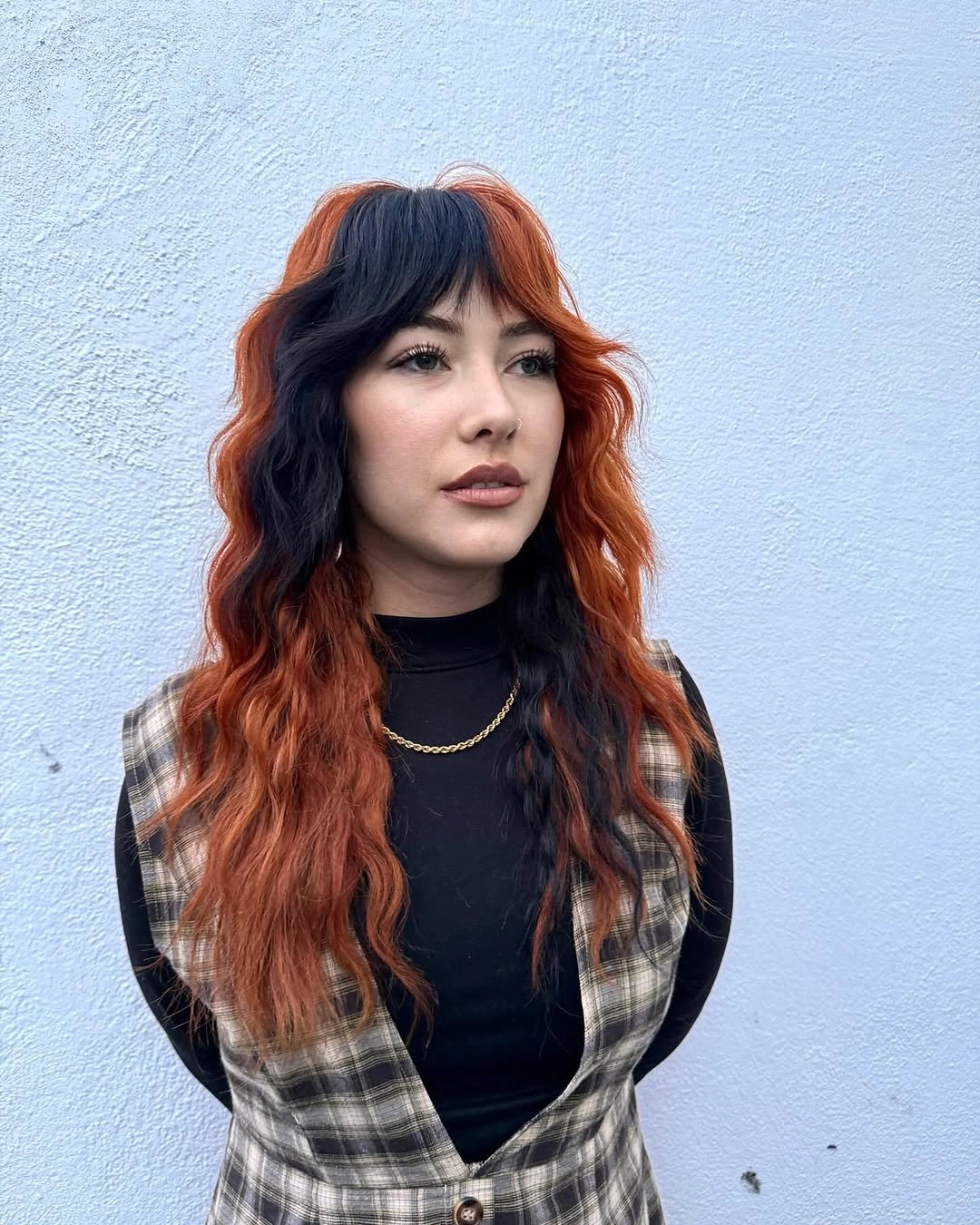 fall hairstyles 2026 Split-Dye Copper and Black Waves for an Edgy Fall Statement