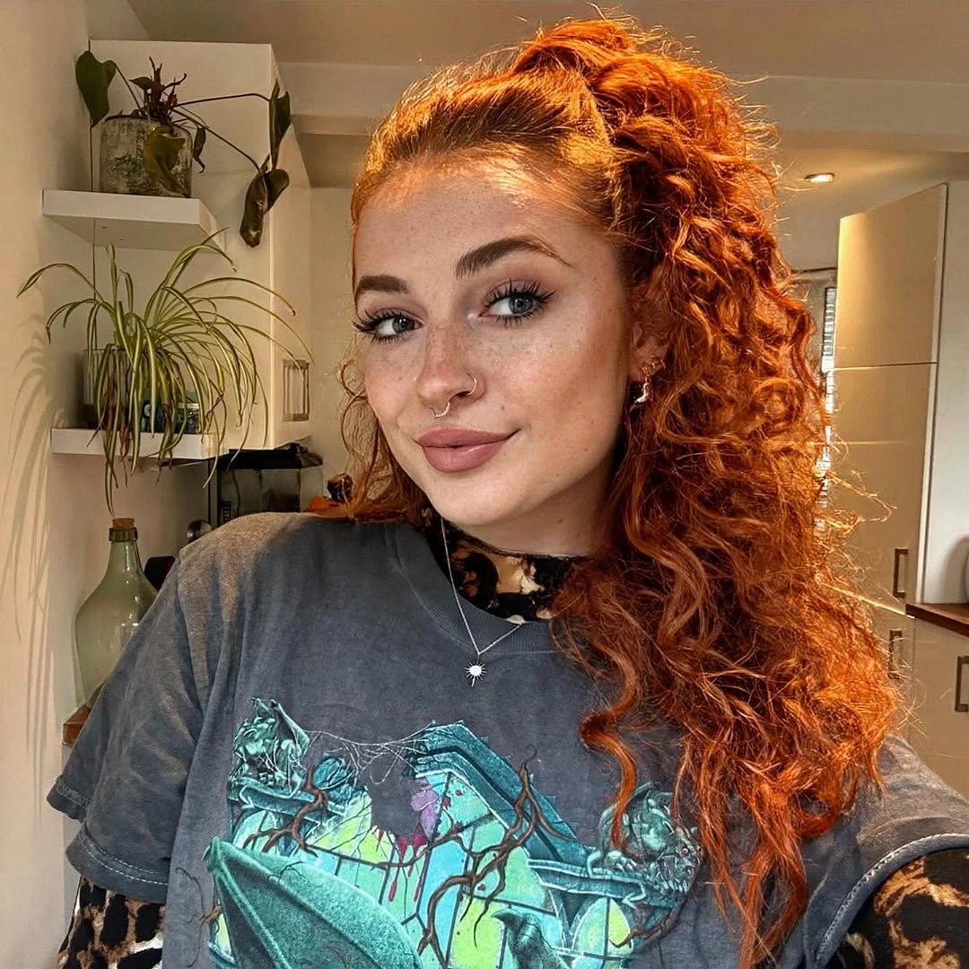 fall hairstyles for long hair 2026 Fiery Curly Half-Up Style Full of Autumn Energy