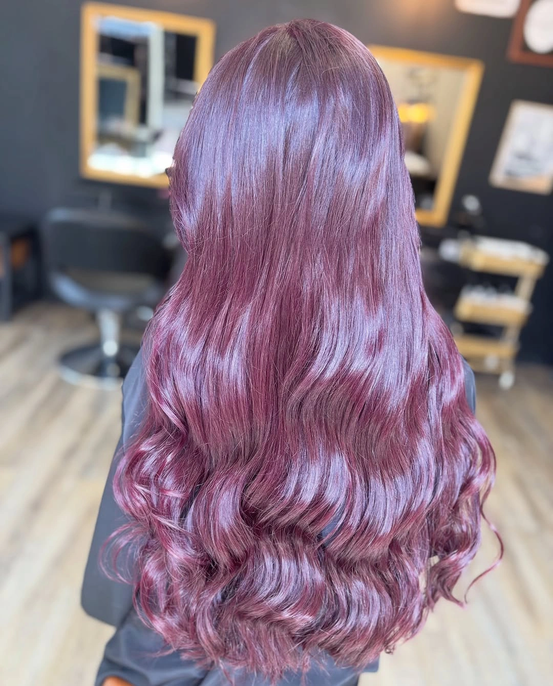 fall hairstyles for long hair 2026 Glossy Mulberry Waves for a Modern Seasonal Statement