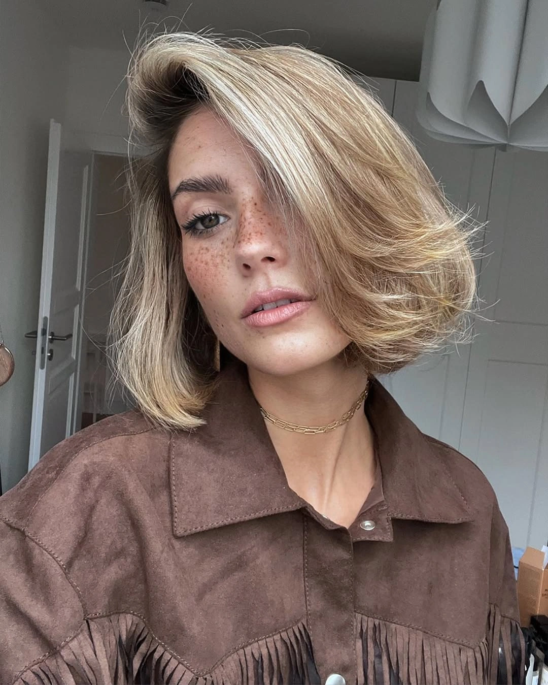 Fall hairstyles for office 2026 Elegant Blonde Bob with Side Volume for a Polished Look