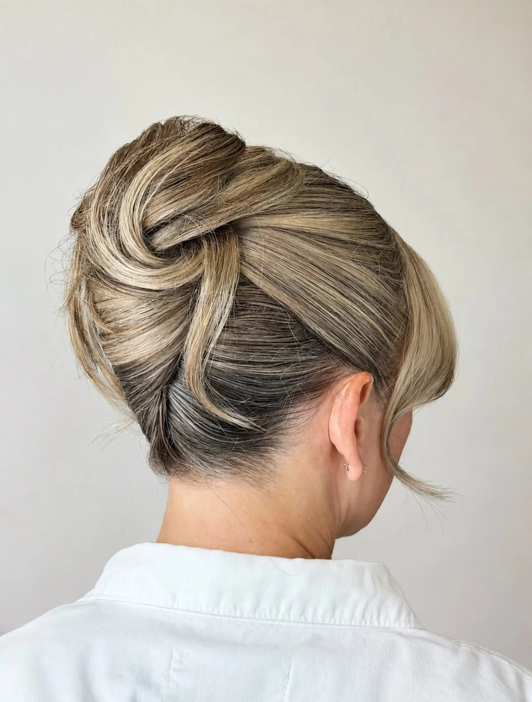 Fall hairstyles for office 2026 Elegant Twisted Updo for Sophisticated Office Style
