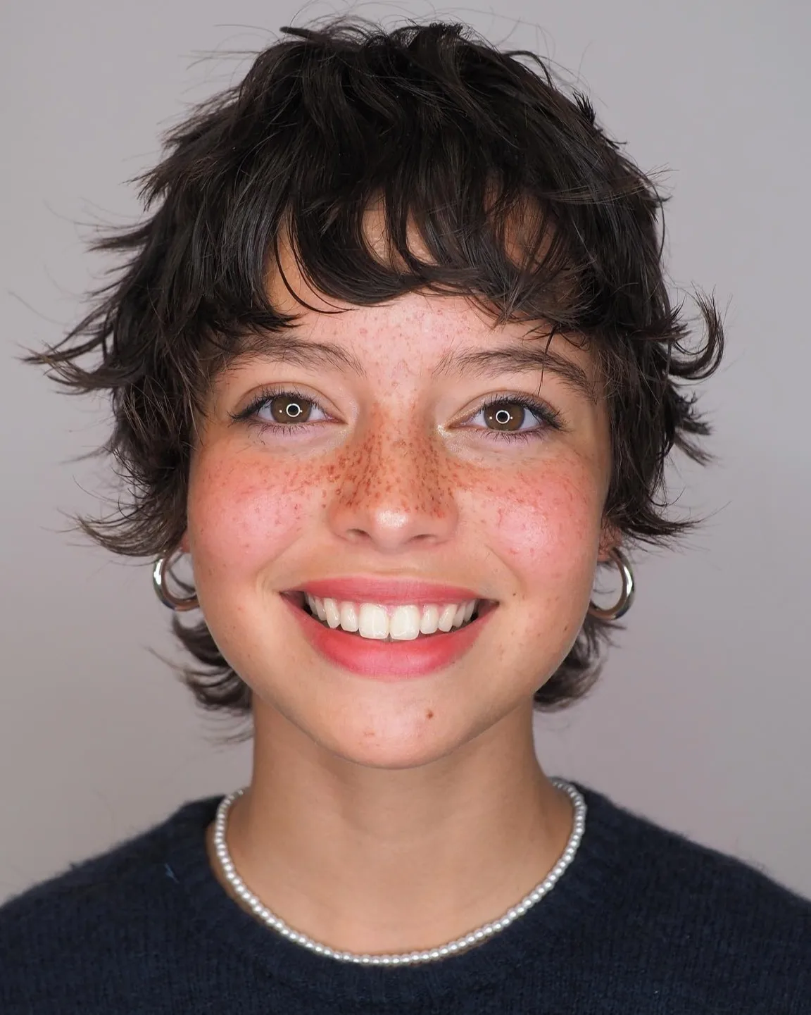 Fall hairstyles for short hair 2026 Soft Feathered Pixie With Relaxed Texture