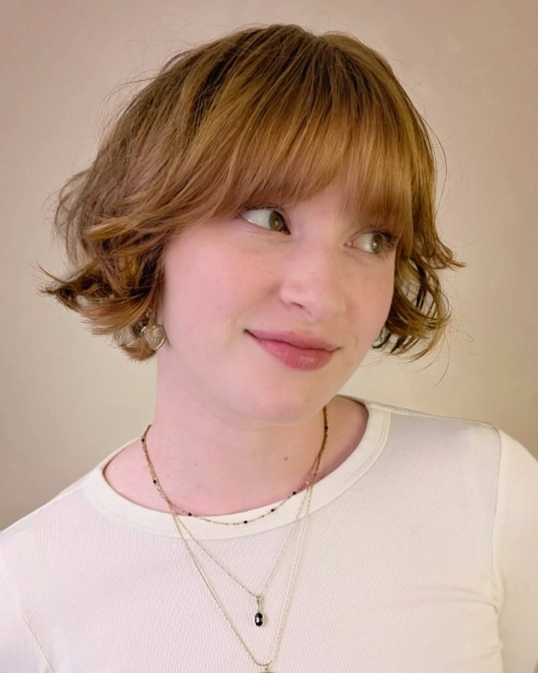 Fall hairstyles for short hair 2026 Soft Flipped Bob With Cozy Autumn Charm