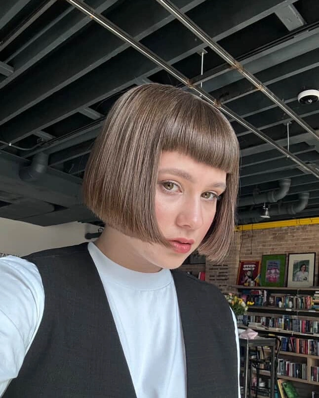 Fall hairstyles for short hair 2026 Graphic French Bob With Sculpted Micro Bangs