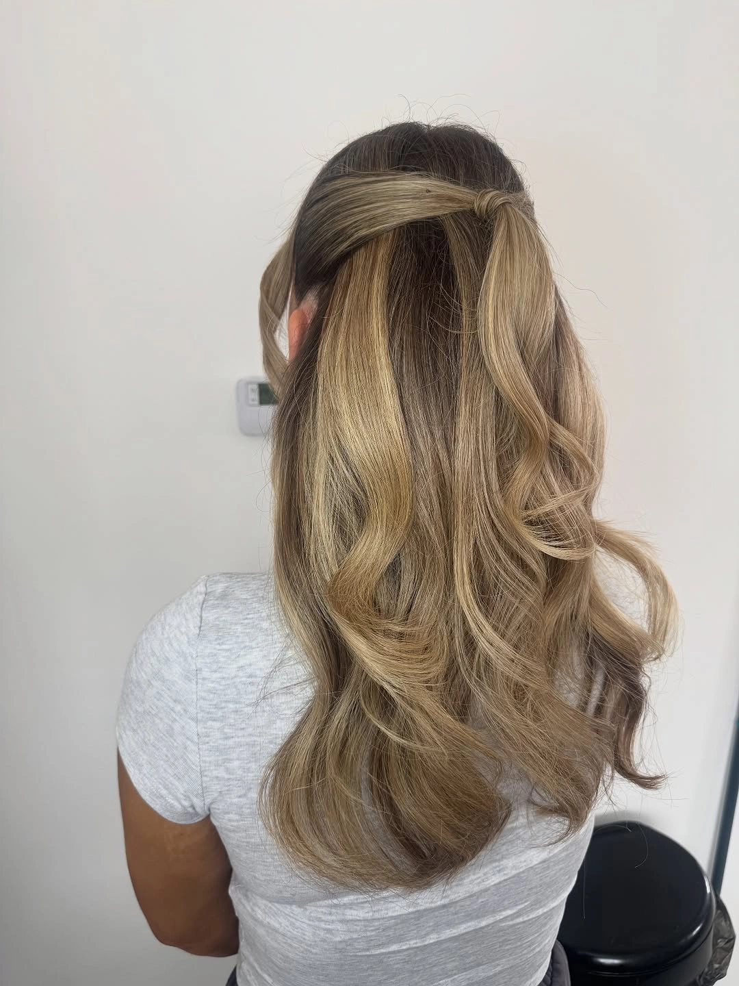 Fall hairstyles for wedding guests 2026 Relaxed Half-Up Style With Soft Blonde Layers