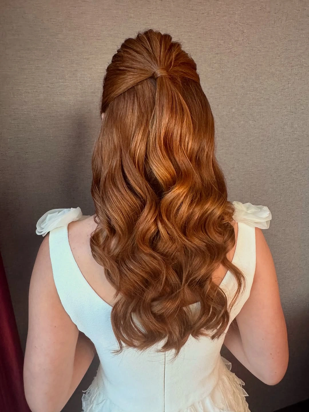 Fall hairstyles for wedding guests 2026 Classic Half-Up Waves With Rich Auburn Dimension