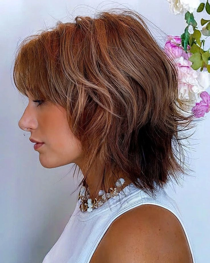 fall medium haircuts 2026 Textured French Shag with Soft Feathered Fringe