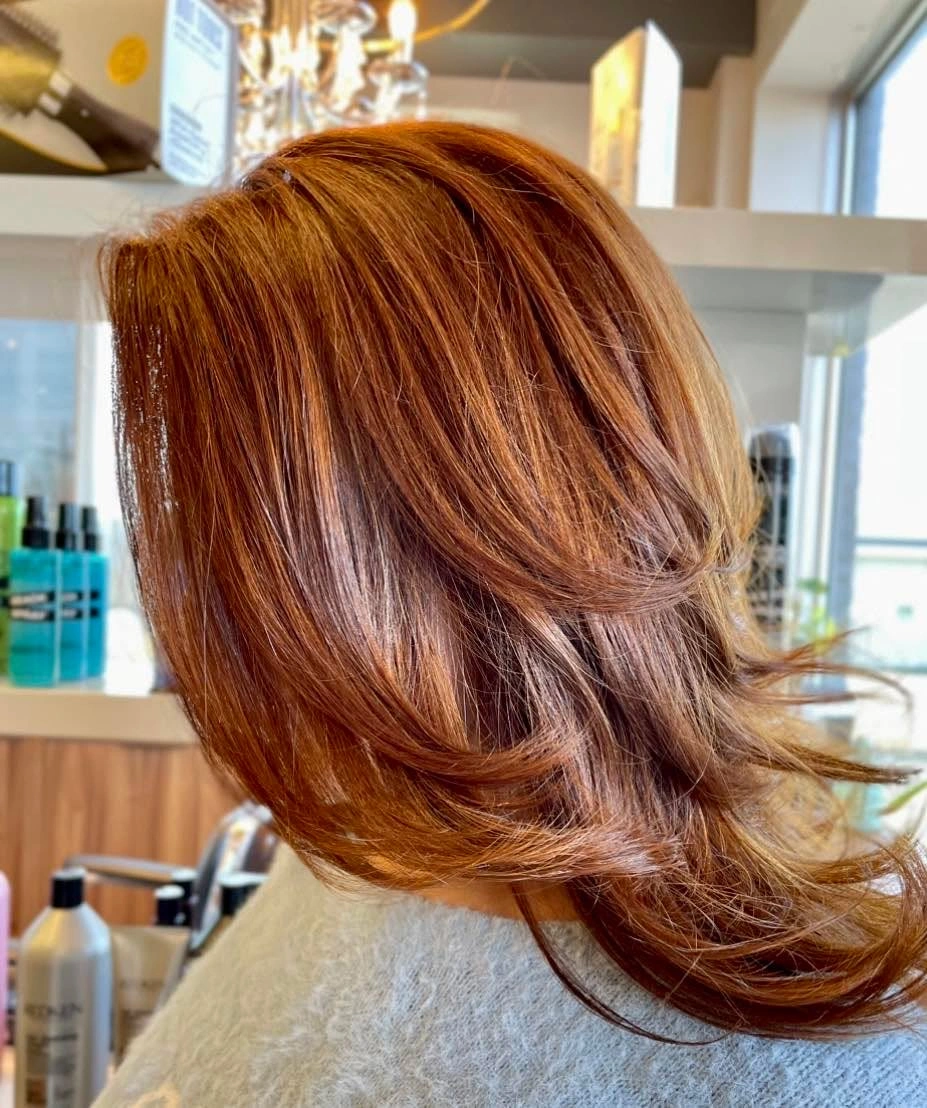 fall medium haircuts 2026 Warm Cinnamon Layers with Salon Blowout Volume
