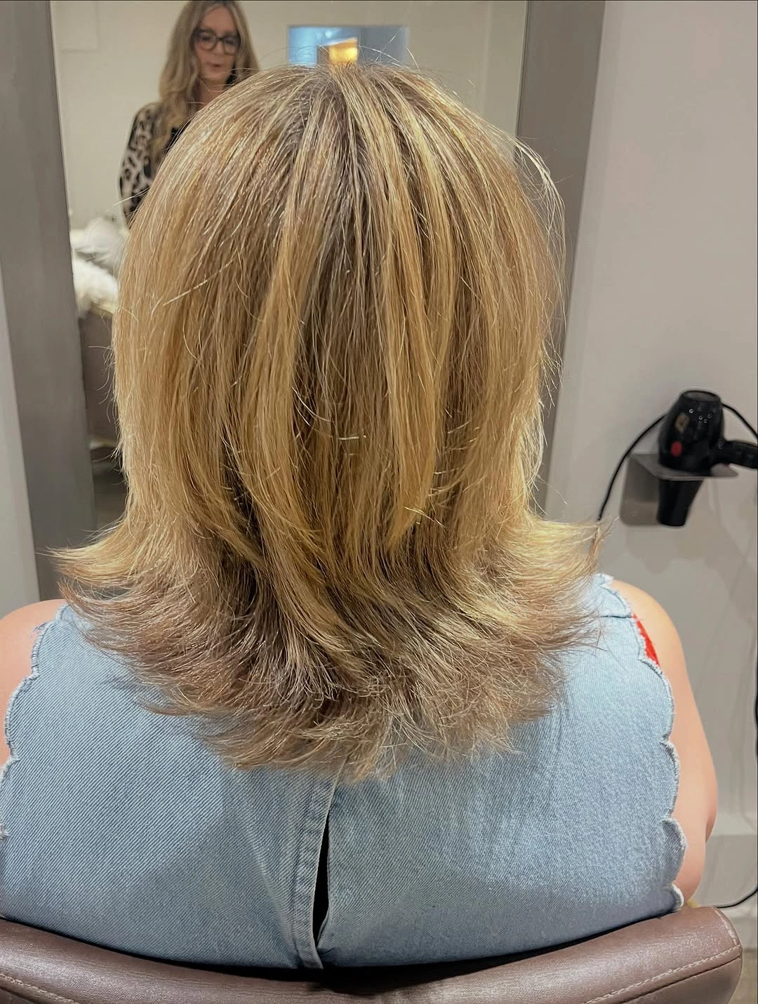 fall medium haircuts 2026 Feathered Blonde Layers with Soft Flipped Ends
