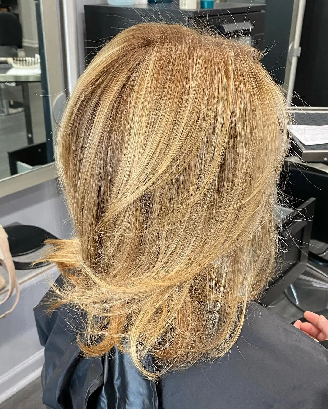 fall medium haircuts 2026 Champagne Blonde Butterfly Layers with Luxurious Movement