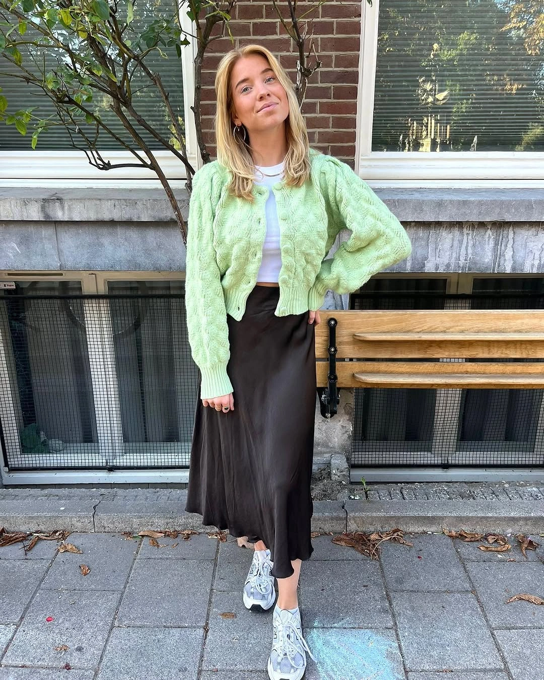 midi skirt fall outfit 2026 Fresh Green Knit with a Dark Satin Midi