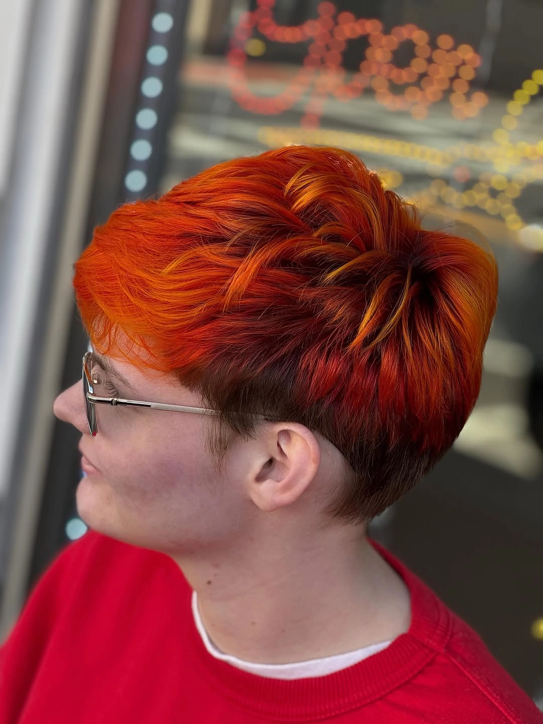 fall pixie haircut ideas 2026 Fiery Copper Pixie With Layered Volume