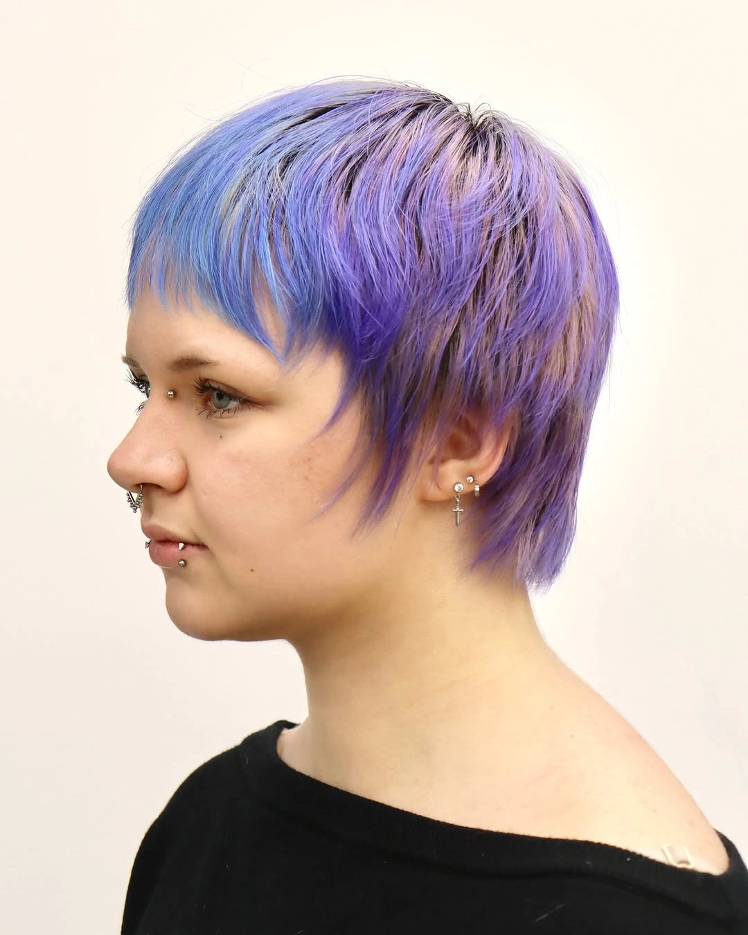 fall pixie haircut ideas 2026 Pastel Lavender Pixie Mullet With Modern Edge