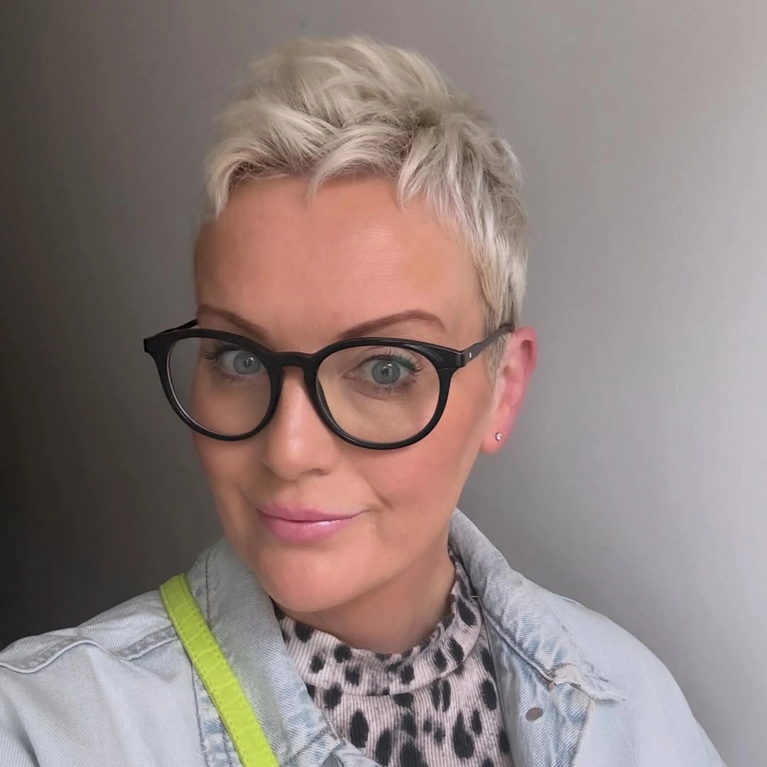 fall pixie haircut ideas 2026 Ultra-Short Platinum Pixie With Modern Edge