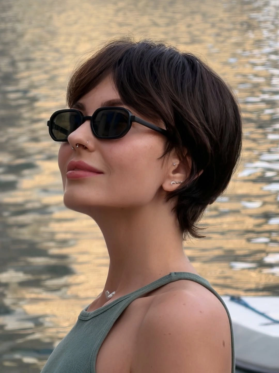 fall pixie haircut ideas 2026 Elegant Long Pixie With Soft Side Layers