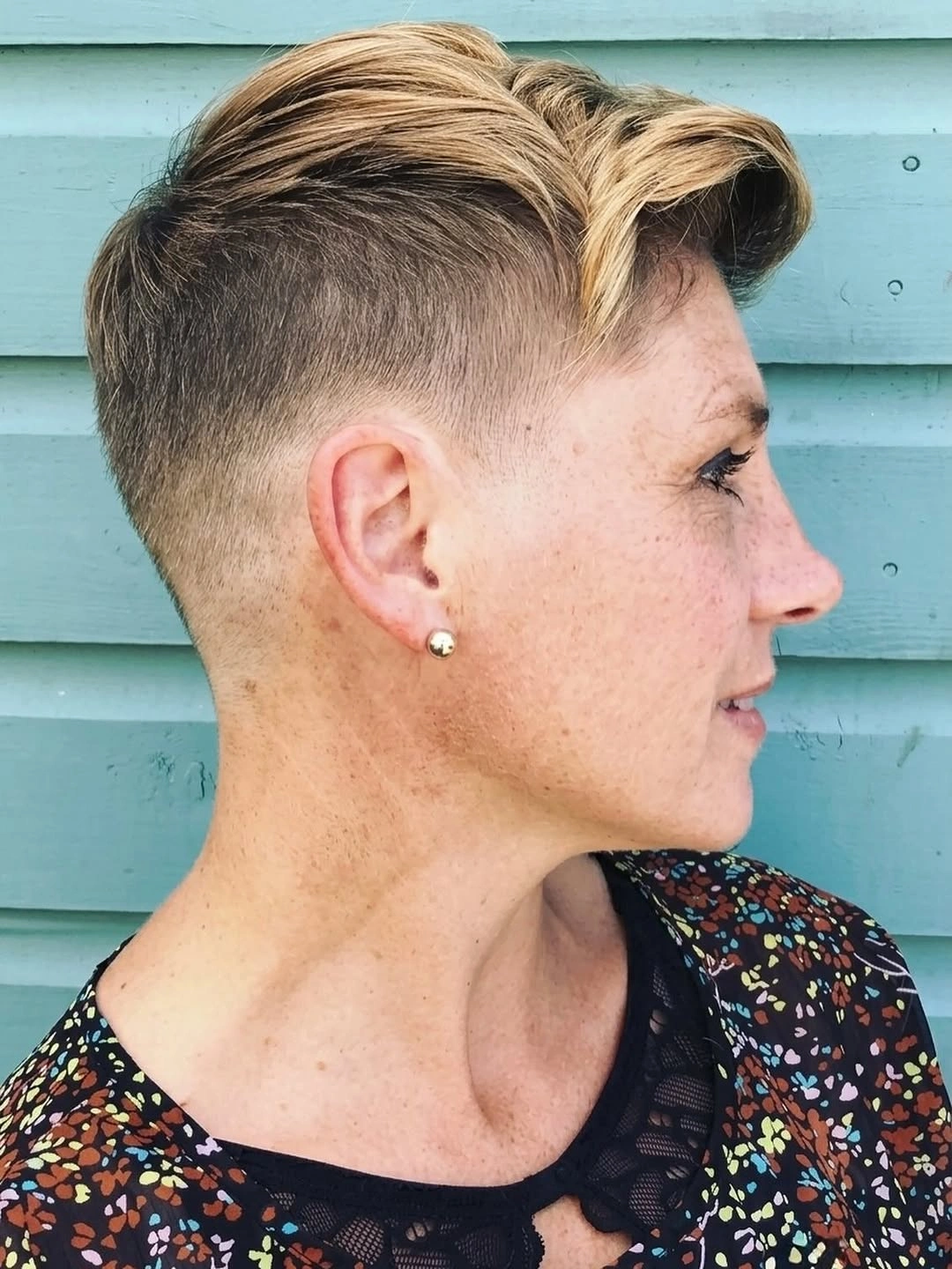 fall short haircuts 2026 Soft Pompadour Pixie With Skin Fade