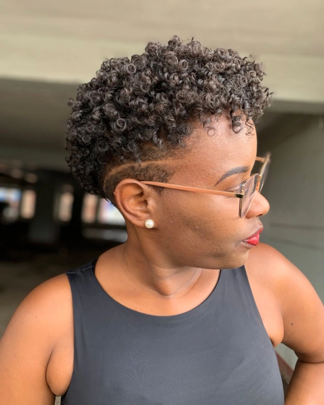 fall short haircuts 2026 Defined Curly Taper With Artistic Side Detail