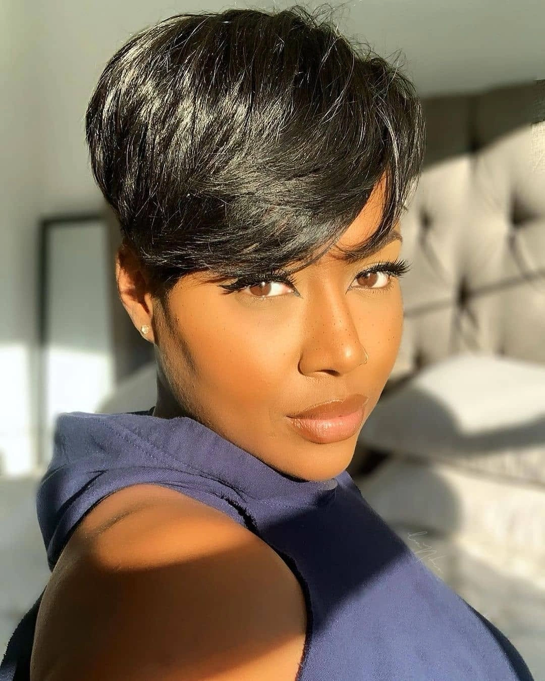 fall short haircuts 2026 Elegant Side-Swept Pixie for Effortless Sophistication