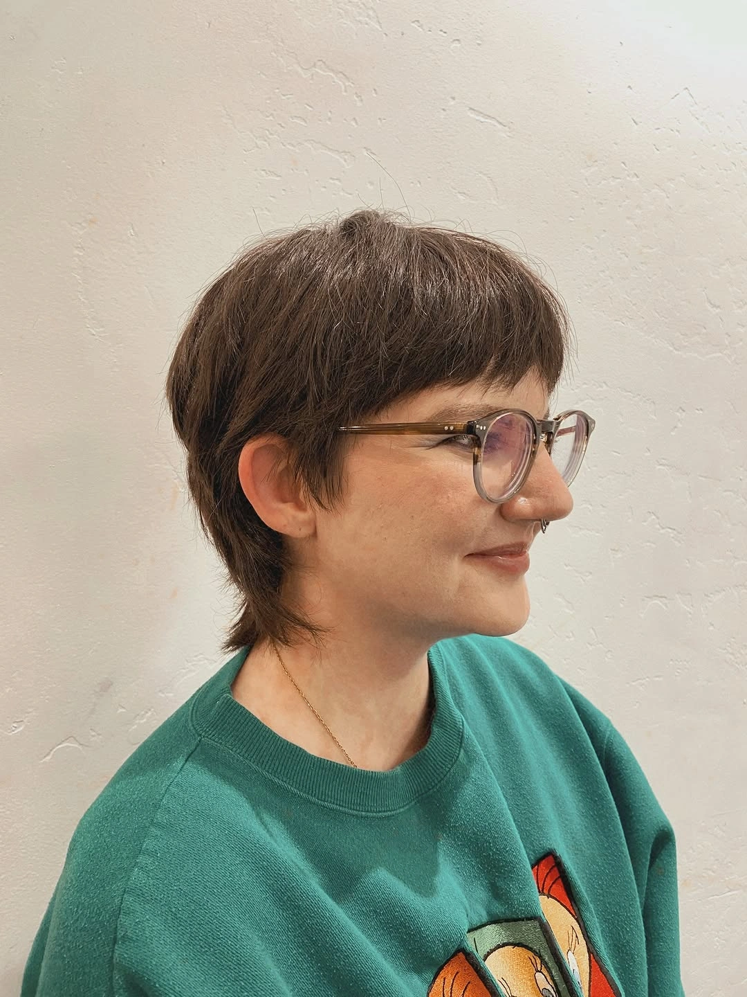 fall short haircuts 2026 Soft Feathered Pixie Mullet With Natural Texture