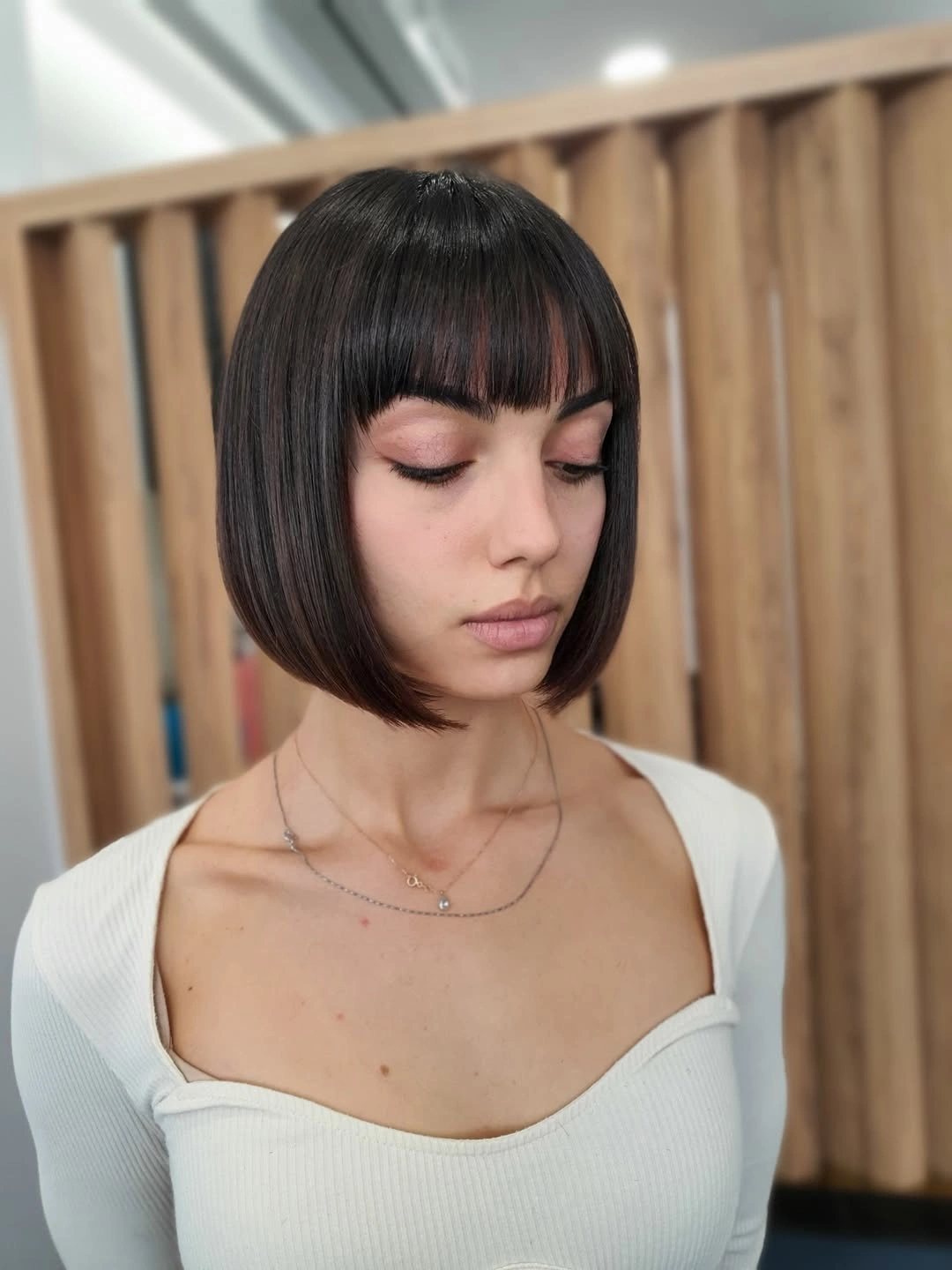 fall short haircuts 2026 Classic Sleek Bob With Soft Full Fringe