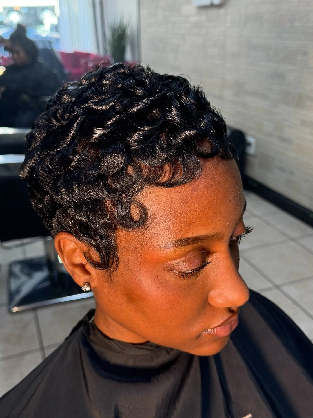 fall short haircuts 2026 Soft Finger Waves on a Cropped Pixie