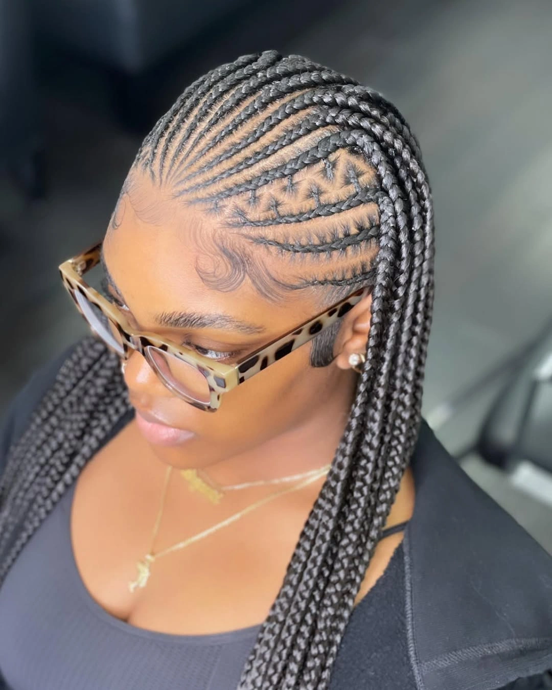 feed in braid hairstyles Side Feed-In Braids With Intricate Scalp Patterns