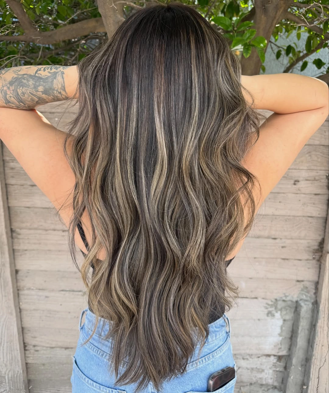 full head babylights blonde on brown hair Long Dimensional Waves With Lived-In Blonde Ribbons