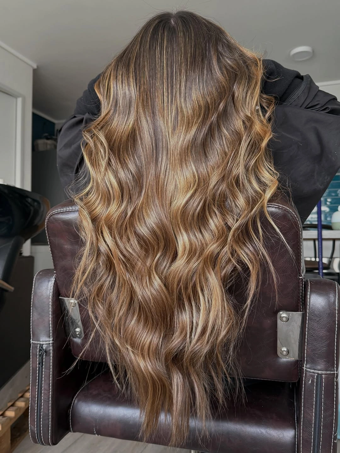 full head babylights blonde on brown hair Long Beach Waves With Soft Honey Dimension