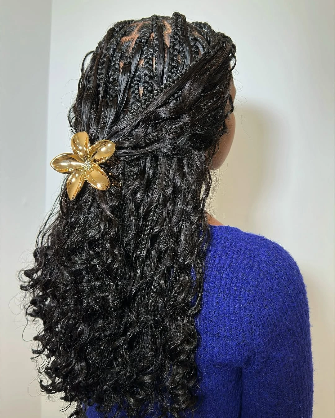 goddess braid Classic Black Goddess Braids with Cascading Curls and a Floral Accent